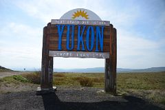 20A Yukon Larger Than Life Sign At The Border With Northwest Territories Dempster Highway On Day Tour From Inuvik To Arctic Circle.jpg